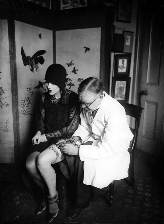 A flapper gets tattooed in the roaring twenties, decades ahead of her time.